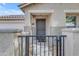 Close-up of front gated entrance to home at 21816 E Puesta Del Sol --, Queen Creek, AZ 85142