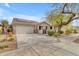 Inviting single-Gathering home featuring a well-maintained yard and wide driveway at 21816 E Puesta Del Sol --, Queen Creek, AZ 85142