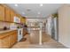 Charming kitchen with wooden cabinets, granite counters, and stainless steel appliances at 21816 E Puesta Del Sol --, Queen Creek, AZ 85142