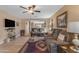Open living room with comfortable furniture and a seamless transition into the kitchen area at 21816 E Puesta Del Sol --, Queen Creek, AZ 85142