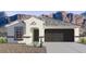 Charming single-story home with a neutral color scheme, complemented by a two car garage and mountain views at 25461 W Graham Trl, Buckeye, AZ 85326