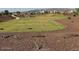 Expansive community greenspace featuring mature landscaping and walking paths at 25461 W Graham Trl, Buckeye, AZ 85326