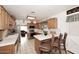 Bright kitchen with oak cabinets, tile countertops, and stainless steel appliances at 2619 W Lamar Rd, Phoenix, AZ 85017
