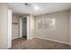 Bedroom with cozy carpet, closet, and bright window, providing a comfortable and relaxing space at 2650 W Union Hills Dr # 350, Phoenix, AZ 85027