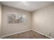 Bedroom with window and neutral walls with neutral carpet at 2650 W Union Hills Dr # 350, Phoenix, AZ 85027
