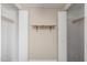 Open closet with wood shelf and white paneled walls at 2650 W Union Hills Dr # 350, Phoenix, AZ 85027