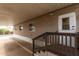 Covered entryway with stairs leading up to a single-story home with exterior windows at 2650 W Union Hills Dr # 350, Phoenix, AZ 85027