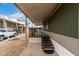 Charming home with a covered porch and steps leading to the entrance, surrounded by gravel landscaping at 2650 W Union Hills Dr # 350, Phoenix, AZ 85027