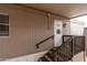 Exterior door with stairs and exterior windows of a single-story home at 2650 W Union Hills Dr # 350, Phoenix, AZ 85027