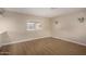 Living room with laminate floors, window with blinds, and neutral walls at 2650 W Union Hills Dr # 350, Phoenix, AZ 85027
