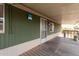 Relaxing covered porch featuring durable wood flooring and calming exterior paint at 2650 W Union Hills Dr # 350, Phoenix, AZ 85027