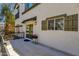 Cozy back patio with awning and privacy fence with view of back exterior of home at 2765 S Cavalier Dr # 102, Gilbert, AZ 85295