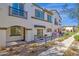 Charming exterior view of the home featuring a patio, shutters, and architectural details at 2765 S Cavalier Dr # 102, Gilbert, AZ 85295