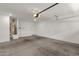 Spacious garage with a water heater and garage door ready for parking and storage at 2765 S Cavalier Dr # 102, Gilbert, AZ 85295