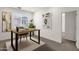Bright office space featuring a modern desk, chair, stylish decor and natural light from the large window at 2765 S Cavalier Dr # 102, Gilbert, AZ 85295