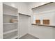 Spacious walk-in closet featuring ample shelving and hanging storage at 2765 S Cavalier Dr # 102, Gilbert, AZ 85295