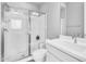Clean bathroom featuring a glass-enclosed shower, sleek vanity, and modern fixtures at 2854 E Cashman Dr, Phoenix, AZ 85050