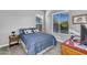 Neutral bedroom with carpet, a full bed, and a bright window with blinds at 2854 E Cashman Dr, Phoenix, AZ 85050