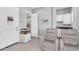 Office area featuring two recliners, a printer on a cart, and built-in shelving at 2854 E Cashman Dr, Phoenix, AZ 85050