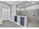 Tiled walk-in shower with glass partition in a bathroom with modern fixtures at 2854 E Cashman Dr, Phoenix, AZ 85050