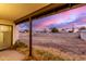 Spacious backyard featuring an extended covered patio perfect for outdoor entertaining at 3037 W Libby St, Phoenix, AZ 85053
