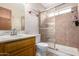 Bathroom featuring tile flooring, a vanity, and a glass enclosed shower at 3037 W Libby St, Phoenix, AZ 85053