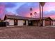 Charming single story home with a large front yard and attached two car garage at 3037 W Libby St, Phoenix, AZ 85053
