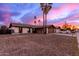Charming single story home featuring a large front yard and an attached garage at 3037 W Libby St, Phoenix, AZ 85053