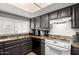 Bright, renovated kitchen with a double basin sink and modern appliances at 3037 W Libby St, Phoenix, AZ 85053