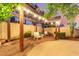 Backyard lounge area with string lights, a gravel patio, and a seating arrangement at 3258 E Vogel Ave, Phoenix, AZ 85028