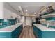Bright kitchen with custom blue cabinets, white countertops, and modern appliances offering both style and functionality at 3258 E Vogel Ave, Phoenix, AZ 85028