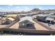 This is an aerial view of the home and the surrounding new construction community at 33395 N 132Nd Dr, Peoria, AZ 85383