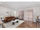 Bright living room with modern furnishings, stylish decor, and ample natural light at 33395 N 132Nd Dr, Peoria, AZ 85383