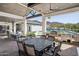 Enjoy the outdoor living space with a seating area and a built in bbq grill to enjoy the pool area at 3939 W Fox Rd, Laveen, AZ 85339