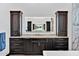 Bathroom featuring marble countertops and dark wood cabinets at 3939 W Fox Rd, Laveen, AZ 85339