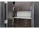 Walk-in closet with lots of storage and marble countertop at 3939 W Fox Rd, Laveen, AZ 85339