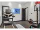 Spacious home gym featuring a treadmill and weight equipment at 3939 W Fox Rd, Laveen, AZ 85339