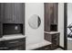 Mud room boasts ample storage and convenient bench seating at 3939 W Fox Rd, Laveen, AZ 85339