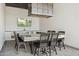 Outdoor kitchen with ample seating, counter space and television at 3939 W Fox Rd, Laveen, AZ 85339
