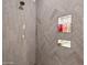Shower features gray herringbone tile with recessed shelving at 3939 W Fox Rd, Laveen, AZ 85339