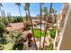 Aerial view of property highlighting pool, landscaping, and red tile roofs at 4200 N Miller Rd # 423, Scottsdale, AZ 85251