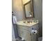 Bathroom featuring a vanity sink, mirror, and towel bar at 50 W Calle De Arcos --, Tempe, AZ 85284