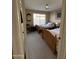 This is a bedroom with two twin beds, a ceiling fan, and a window at 50 W Calle De Arcos --, Tempe, AZ 85284