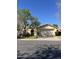 Charming single-story home with a well-manicured front lawn and inviting curb appeal at 50 W Calle De Arcos --, Tempe, AZ 85284