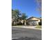 Charming single-story home with a well-manicured front lawn and inviting curb appeal at 50 W Calle De Arcos --, Tempe, AZ 85284