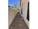 Functional side yard featuring gravel landscaping, pavers, and wall offering extra privacy at 50 W Calle De Arcos --, Tempe, AZ 85284