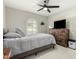 Cozy bedroom featuring a comfortable bed, neutral colors, and natural light creating a relaxing and inviting atmosphere at 5129 W Echo Ln, Glendale, AZ 85302