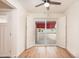 Bright dining area featuring sliding doors and shutter window coverings at 5607 N 76Th Pl, Scottsdale, AZ 85250