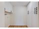Spacious laundry room with white cabinets and washer hook-ups at 5607 N 76Th Pl, Scottsdale, AZ 85250