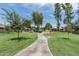 Scenic view of community park with lush greenery, walking paths, picnic areas and playground for outdoor activities at 6514 S Lakeshore Dr # C, Tempe, AZ 85283